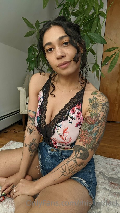 Misha Black modelo superior fotos