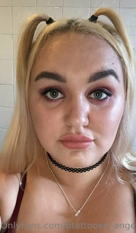 btattooed angel modèle sexy images