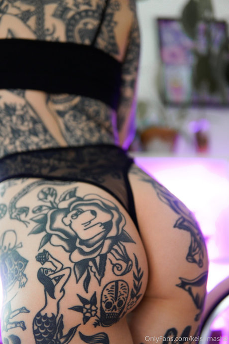 Tattooed Russian model naked image