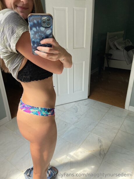 Naughtynursedemi xxx model photo